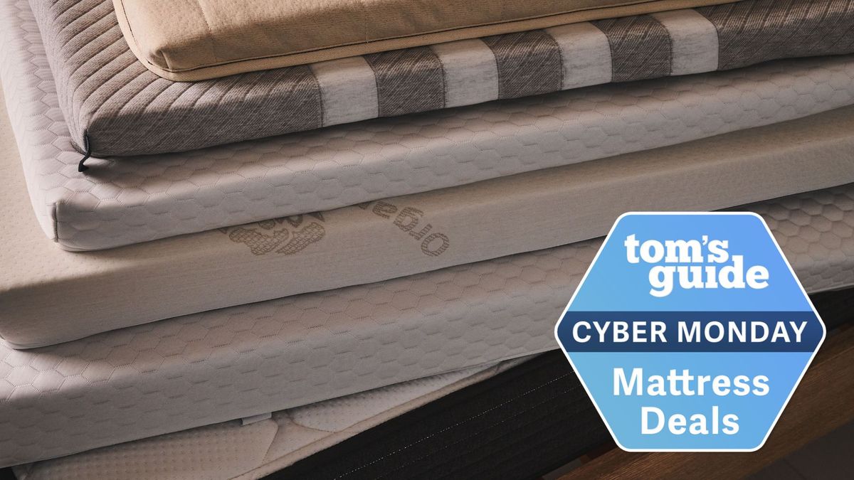 A stack of mattress toppers with a Cyber Monday deals badge 