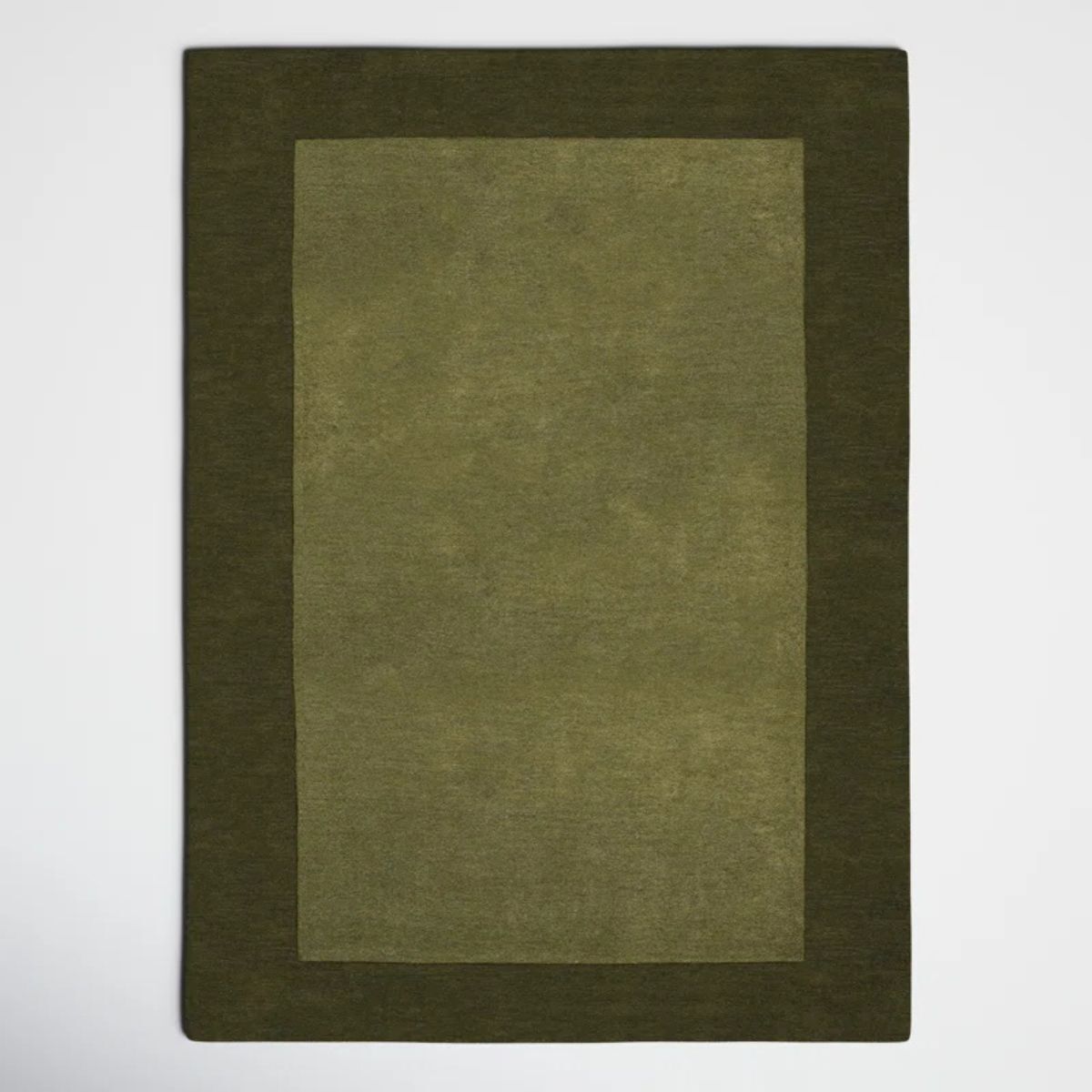 A dark green rug