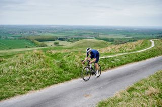 Male cyclist riding intervals in his training ride