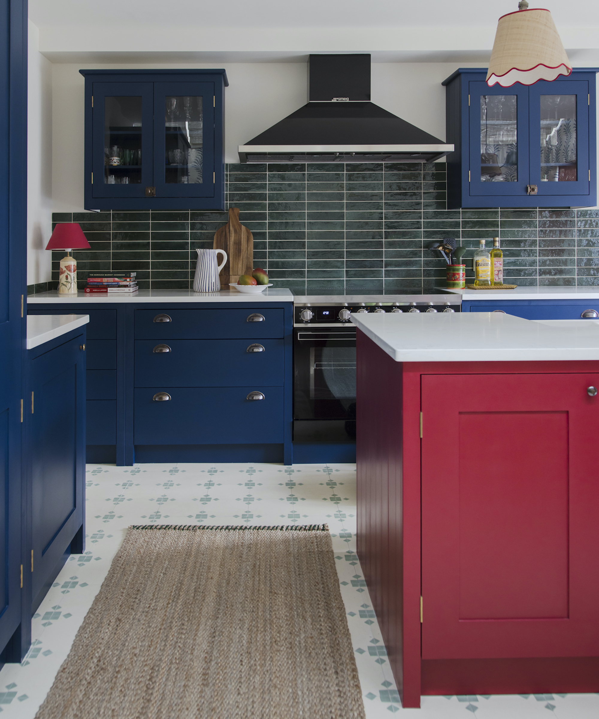 kitchen with red island and blue cabinets
