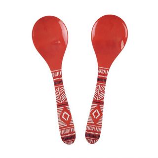 printed red and white geometric pattern on salad server