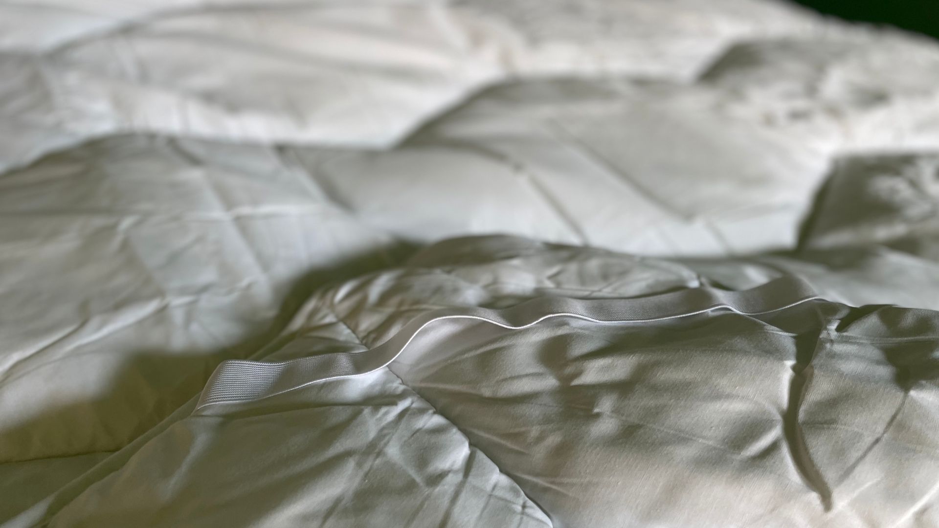 The White Company Hypoallergenic Topper stitching