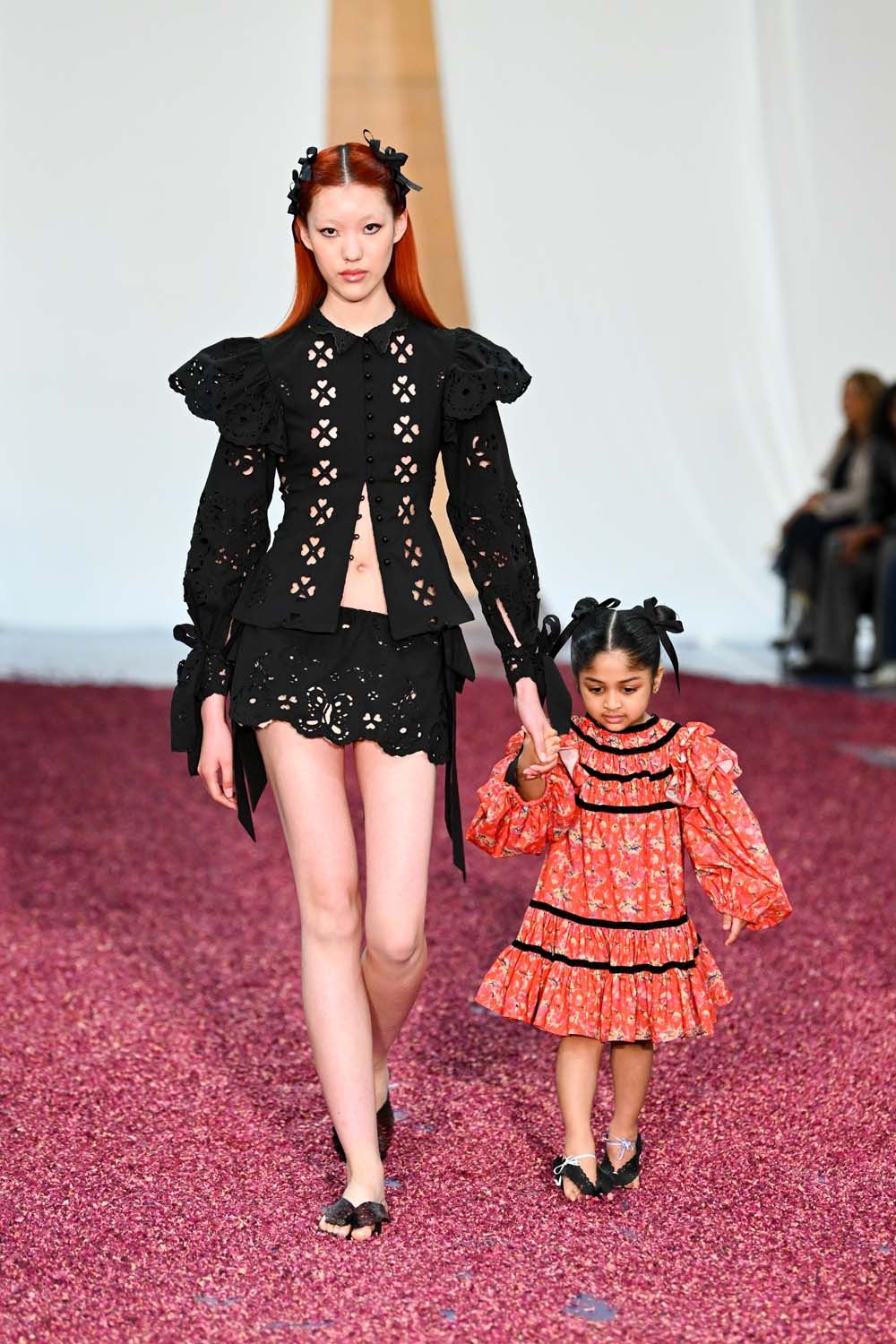 on the runway at London Fashion Week AW23