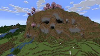 Minecraft seeds - a spooky skull mountain goes kawaii with a cherry blossom forest hat