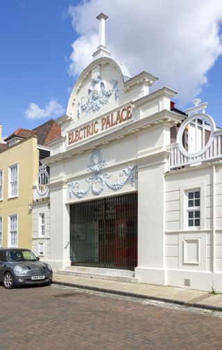 White building facade with dome roof