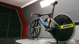 The black Stromm track bike stands in a wind tunnel