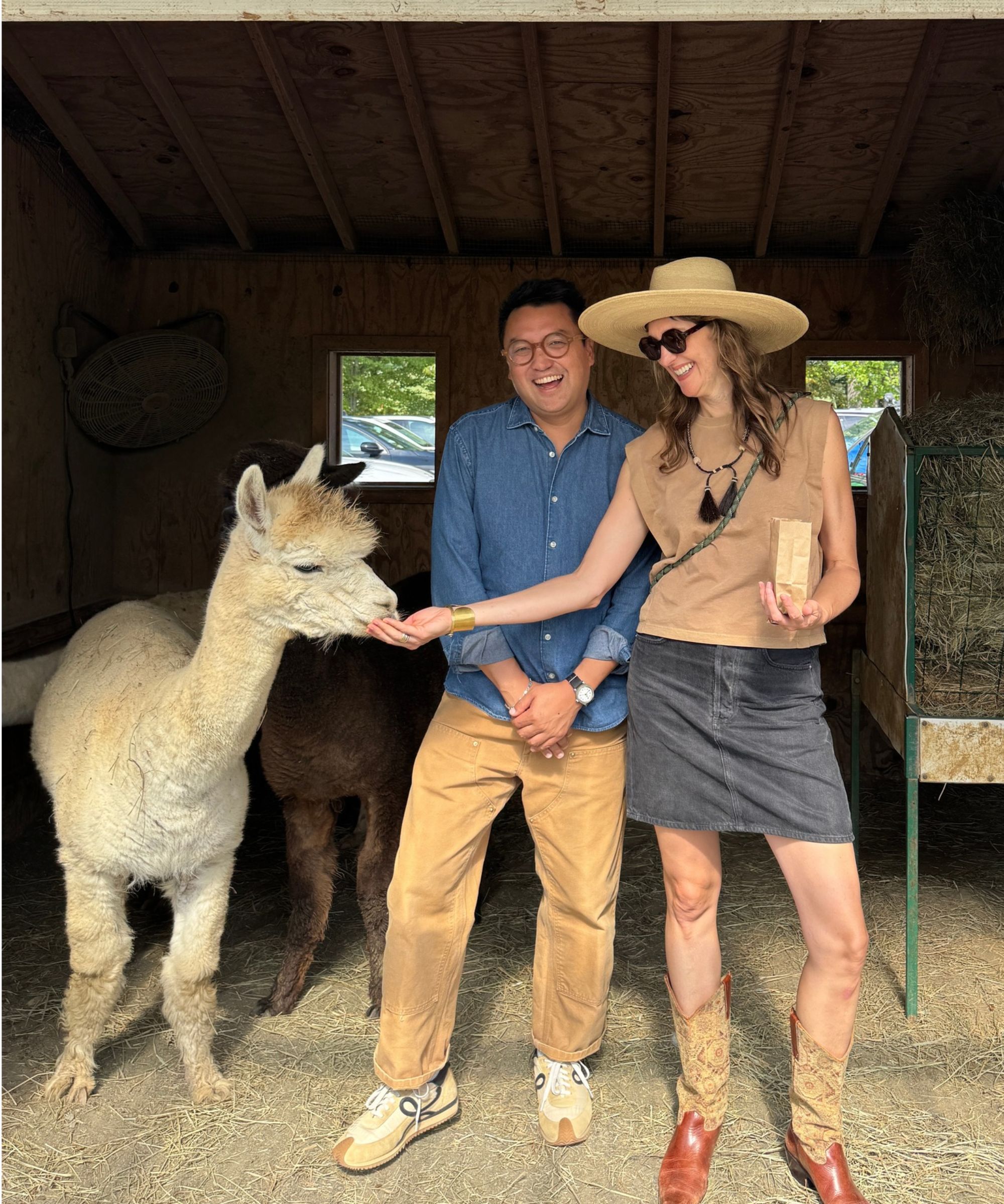 A llama with Ben Reynaert and the creative director of Pollack
