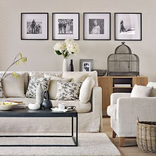 living room with wall photographs