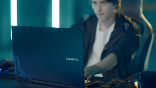 A Gen-Z gamer playing on a Gigabyte G-series laptop