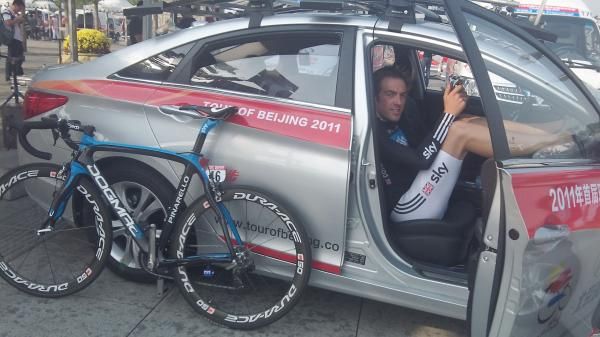 Alex Dowsett (Sky) awaits the podium ceremony and the best young rider's jersey.