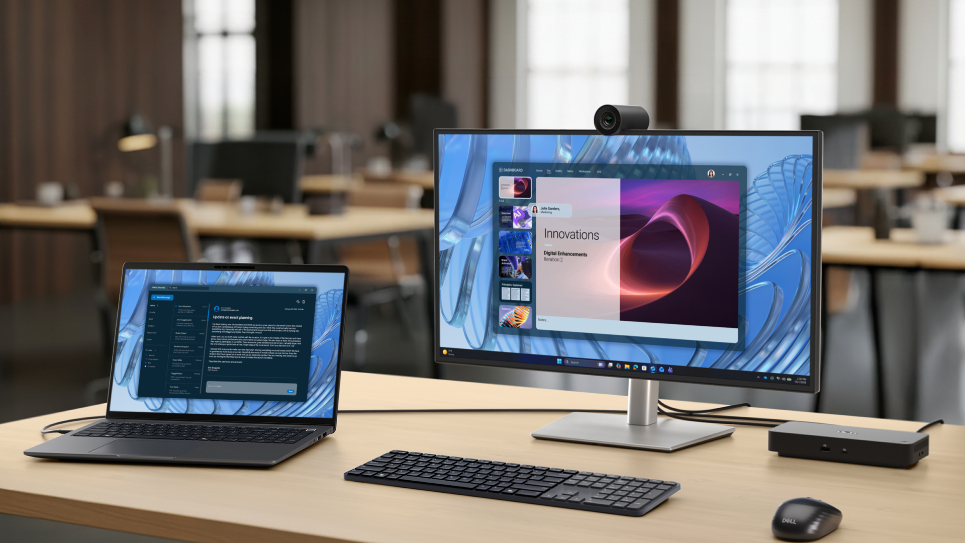 Dell Pro laptop on a desk connected to a monitor and docking station