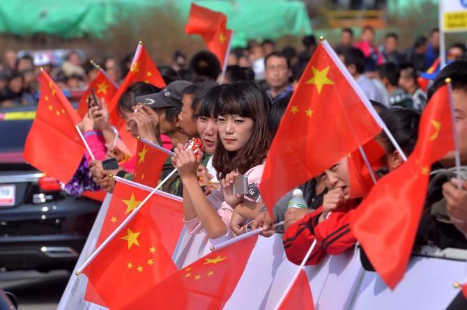 There were plenty of fans with flags at the finish