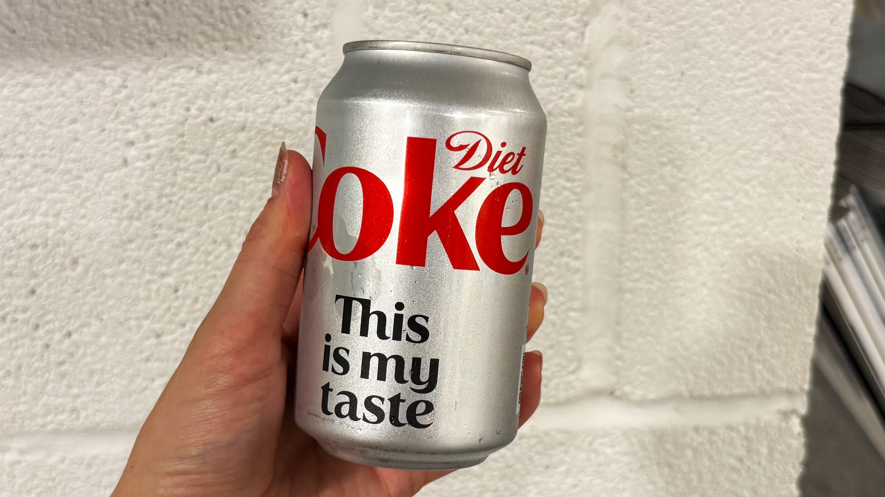 a photo of the viral fridge cigarette coffee + diet coke being made
