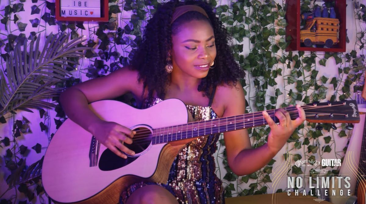 Helen Ibe plays a Martin SC-10 acoustic guitar