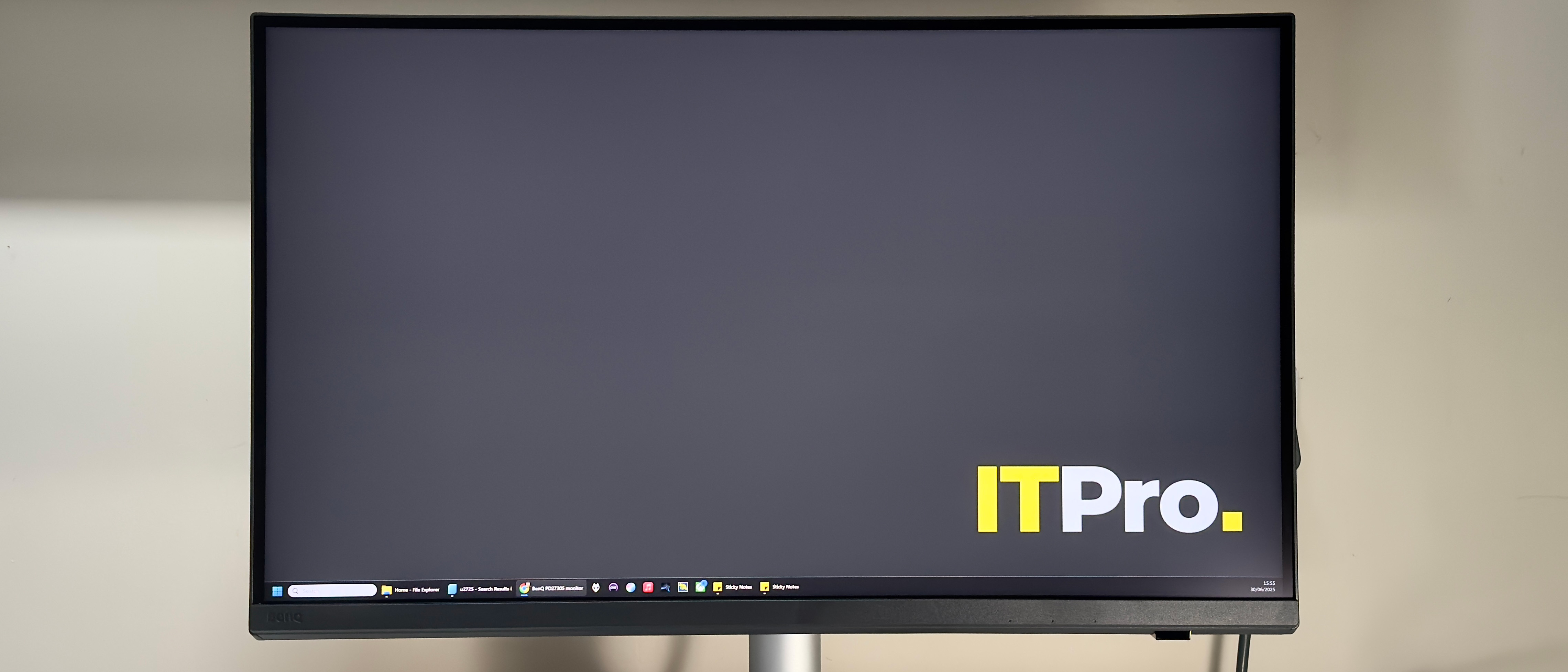 The BenQ PD2730S monitor on a desk