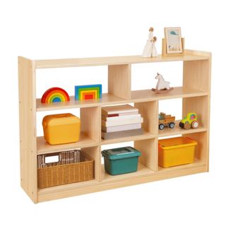 Montessori shelving unit with 8 sections and toys and books on it