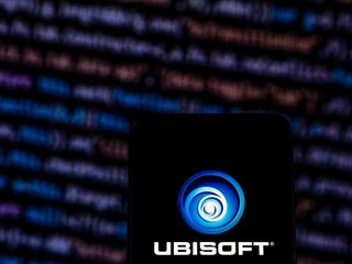 Image of the Ubisoft logo appearing on a phone before lines of code