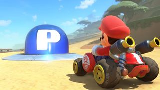 Mario Kart World screenshot featuring Mario and a P Switch