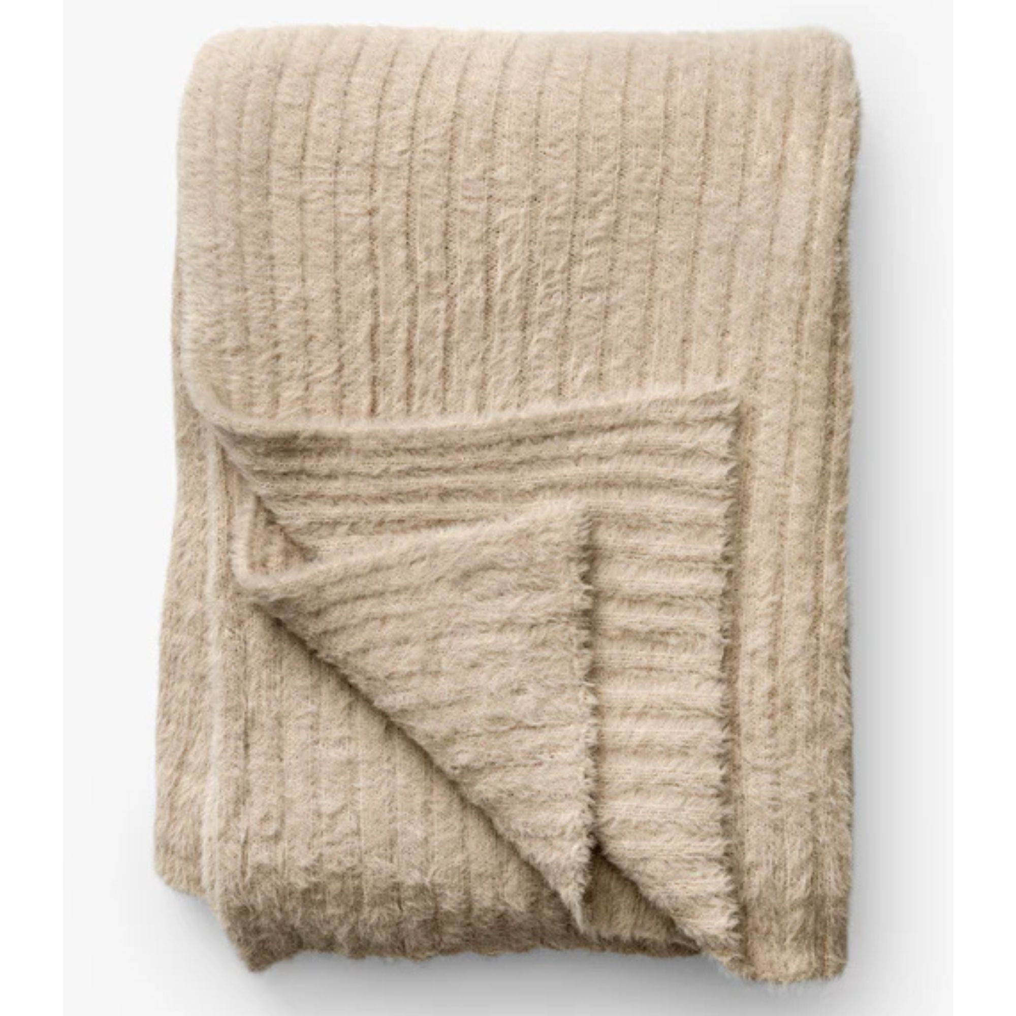 Beige throw blanket