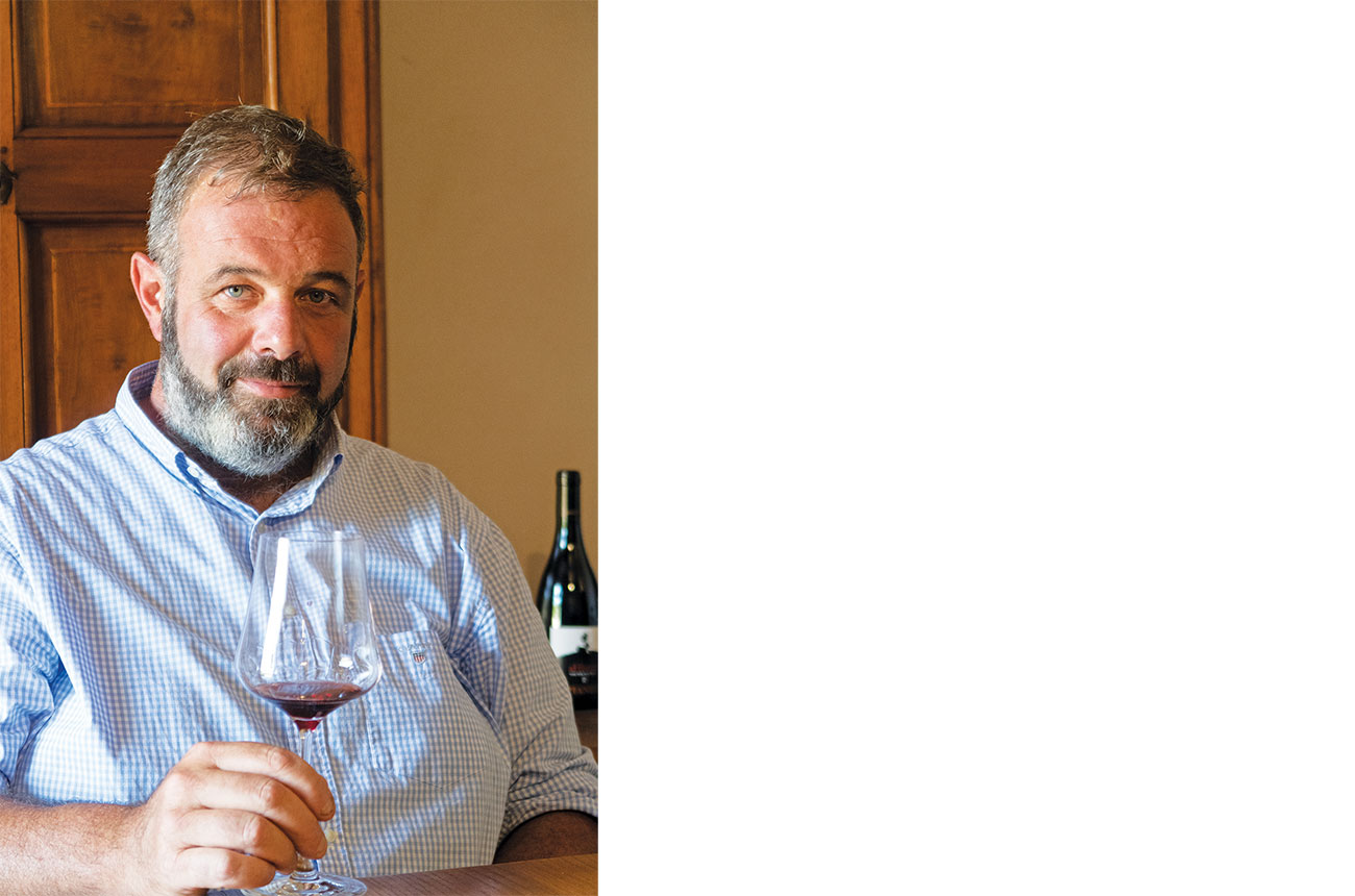 Andrea Zanetta with glass of wine