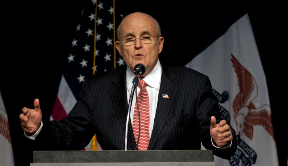 Former NYC Mayor Rudy Giuliani warming up the crowd during a Trump presidential campaign rally in Iowa, September 2016.