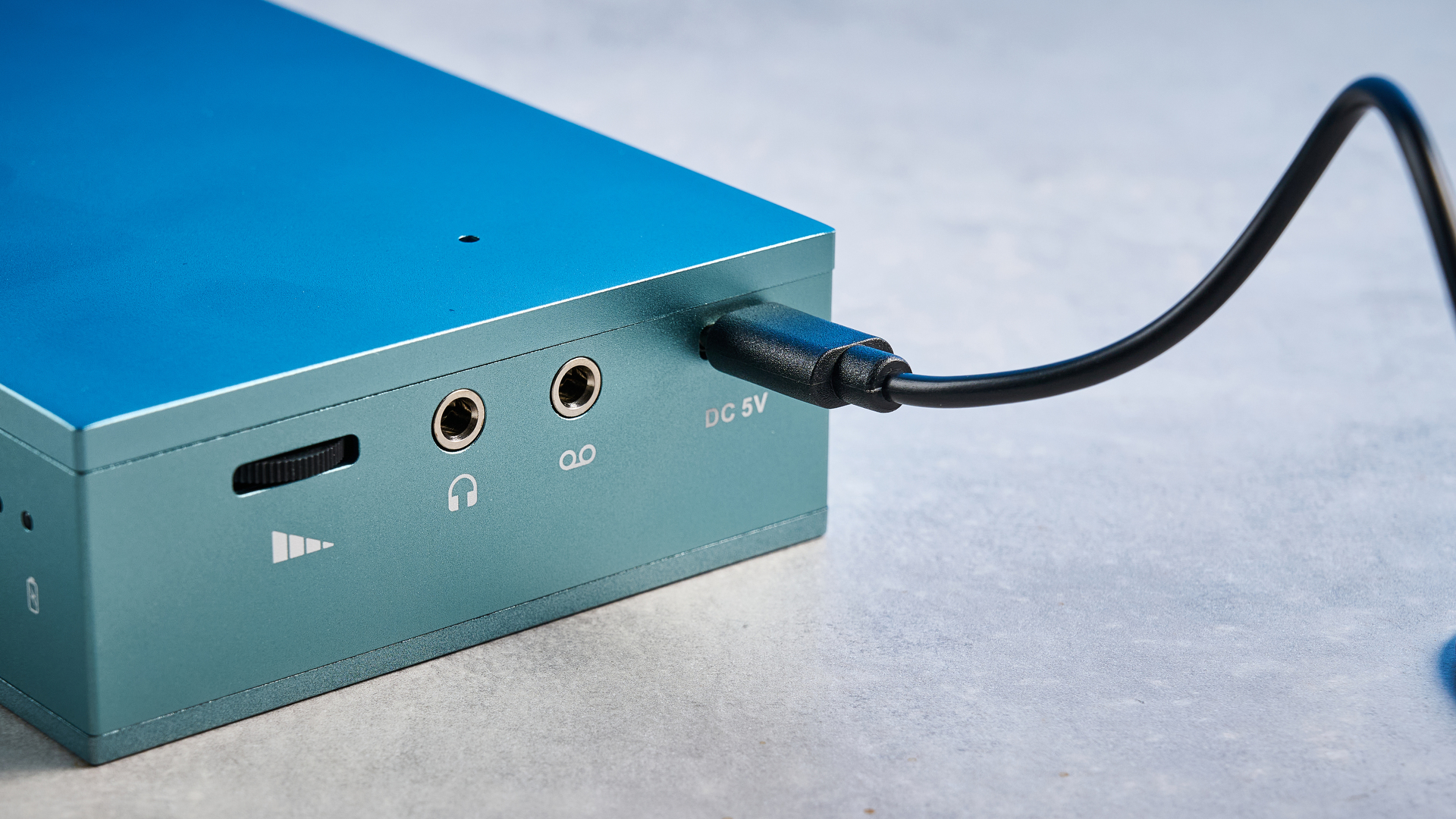 We Are Rewind Cassette Player in blue photographed in front of a blue background