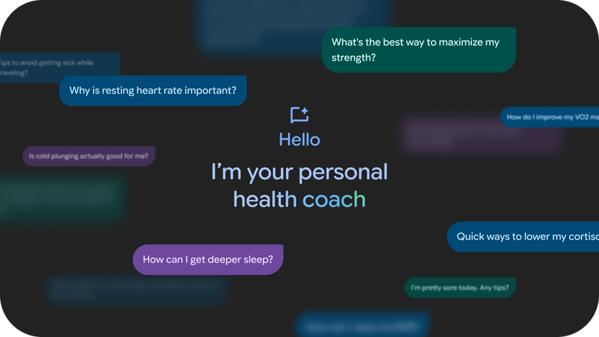A screenshot showing &quot;Hello: I&#039;m your personal health coach&quot; on a dark background with text bubbles surrounding the text with sample questions for the Fitbit AI coach.