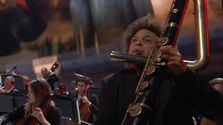 Flute Guy, a prolific musician by the name of Pedro Eustache, absolutely kills it on stage while Spider-Man 2's theme plays.