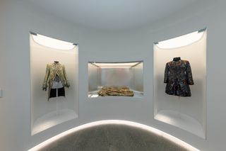 Gallery view of The Met’s Sleeping Beauties Reawakening Fashion, featuring a trio of clouson-style historical jackets