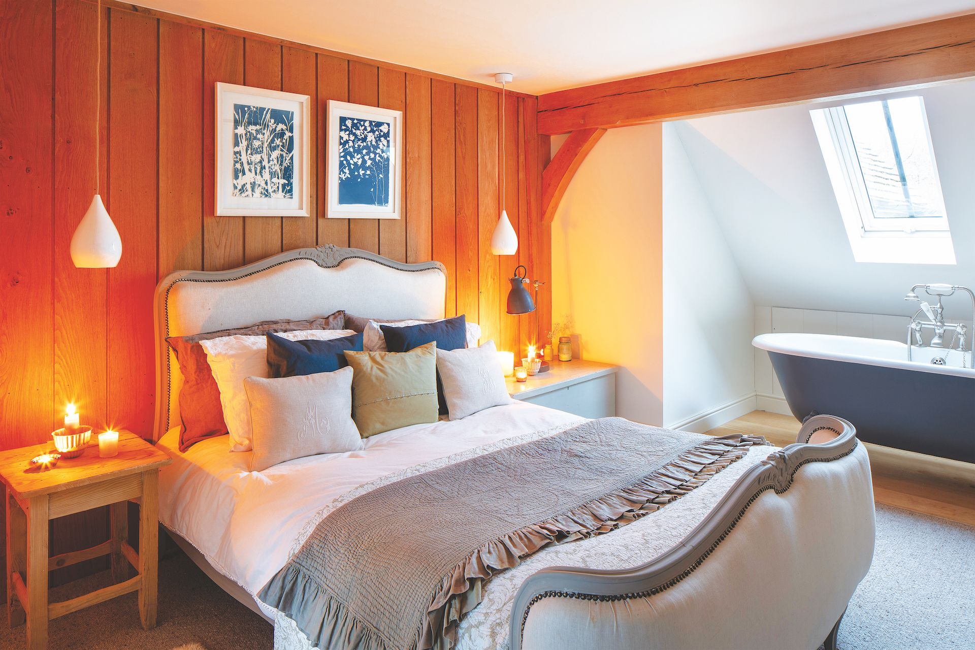 cabin style bedroom with bath in room and oak panel walls