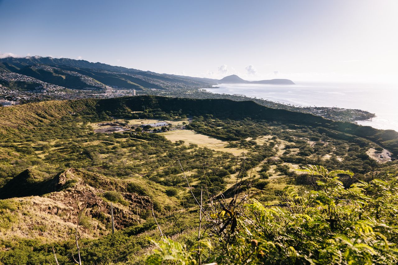 The footpath climbs to the rim of an extinct volcano