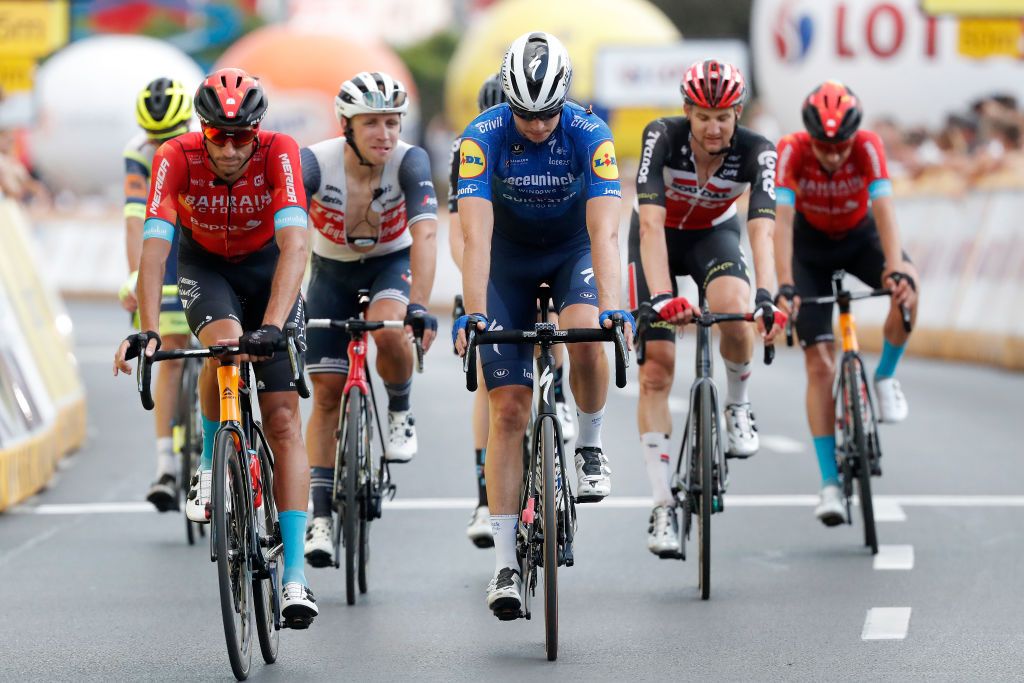 RZESZOW POLAND AUGUST 11 Ian Garrison of The United States and Team Deceuninck QuickStep at finish line during the 78th Tour de Pologne 2021 Stage 3 a 226km stage from Sanok to Rzeszw TourdePologne TDP2021 UCIWT on August 11 2021 in Rzeszow Poland Photo by Bas CzerwinskiGetty Images
