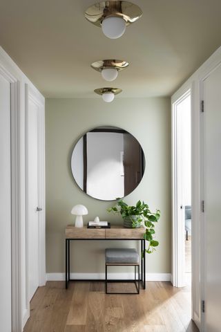 An entryway with mirror