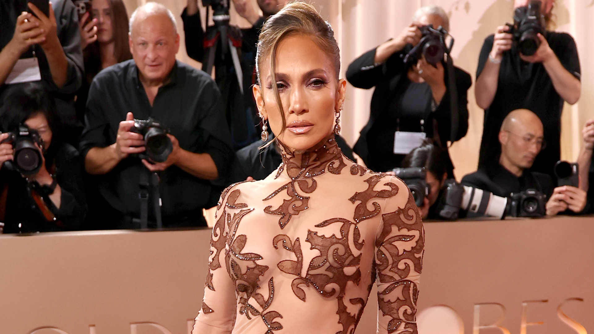 Jennifer Lopez at the 2026 Golden Globes in a vintage naked dress