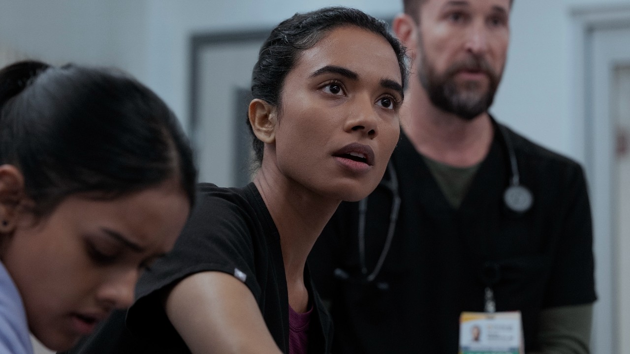 From left to right: Javadi looking down, Mohan looking up and Robby standing behind her.