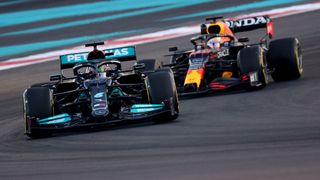 Formula 1 drivers Lewis Hamilton and Max Verstappen competing at the Abu Dhabi Grand Prix
