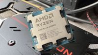 A close-up photo of an AMD Ryzen 5 9600X CPU