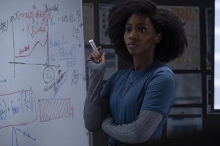 Monica Rambeau at a white board. 