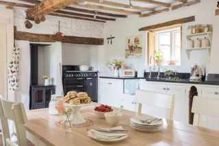 kitchen in a grade II listed thatched cottage with beams