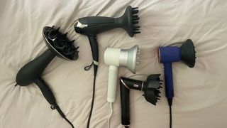 A selection of the best hair dryer for curly hair, picked by beauty editor Rhiannon Derbyshire. These include Curlsmith, ghd, Zuvi, Dyson and Shark