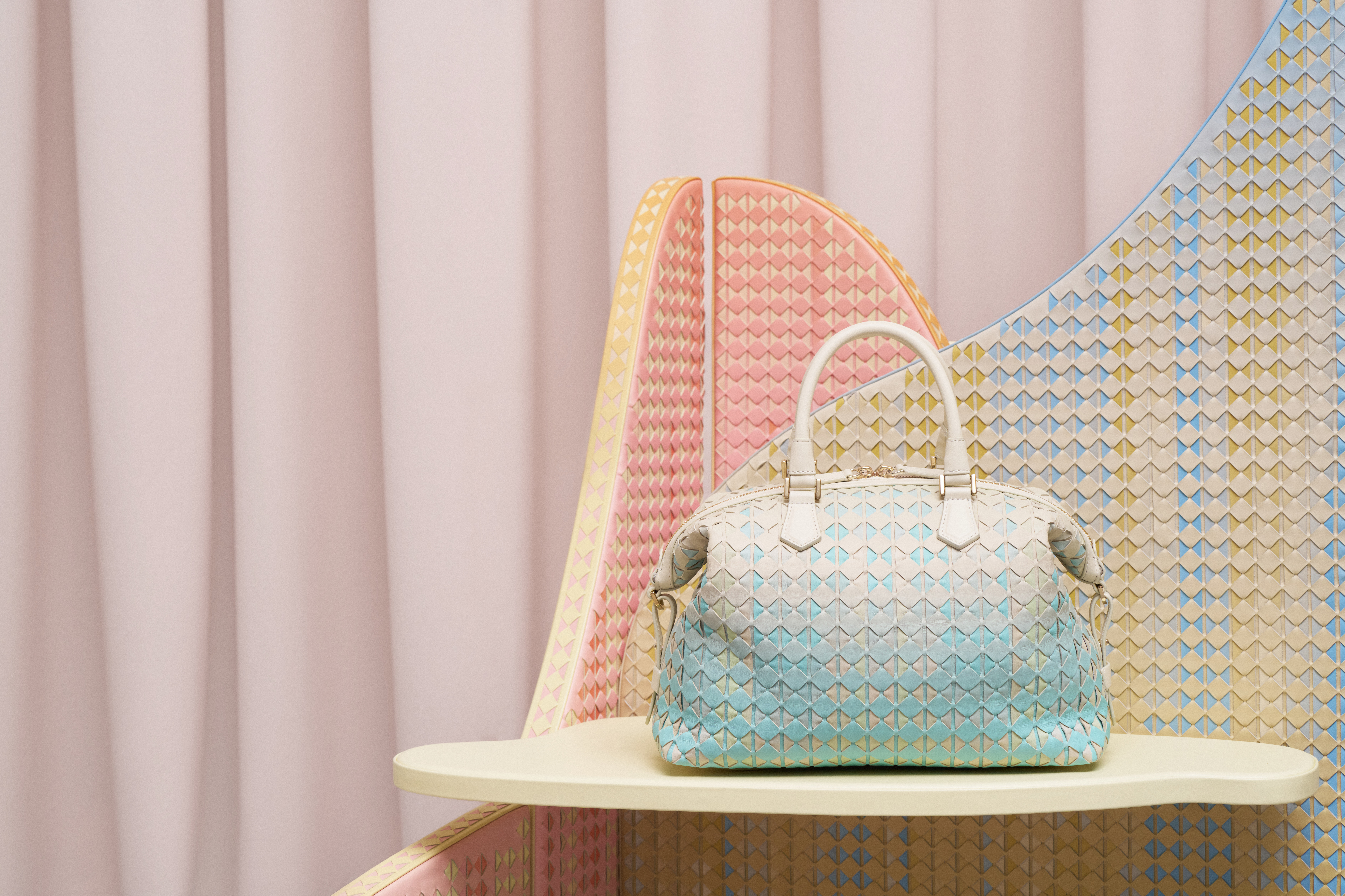 Leather bags by Serapian and Bethan Laura Wood defined by an ombre effect of pastel colours
