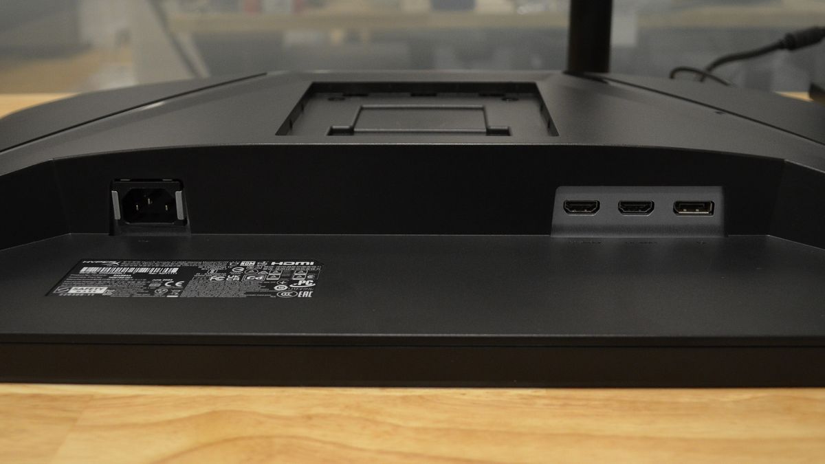 A HyperX Armada 27 on a wooden desk