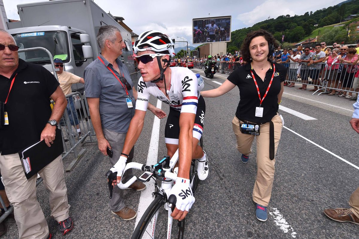 Peter Kennaugh rides to the podium after his win