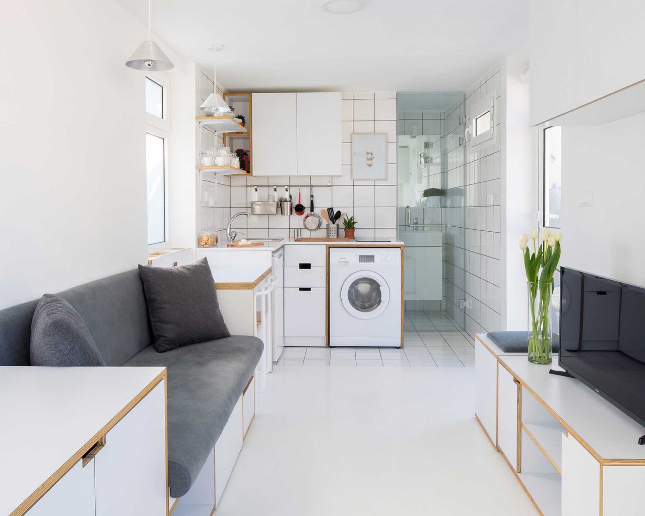 a small white micro apartment