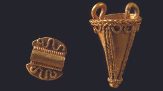 Gold pendant found near the Jell Mound. This type or ornament was common in high-status female burials from A.D. 1 to A.D. 400.