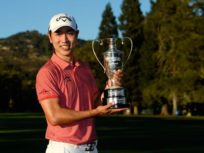 Sang-moon Bae with the Frys.com Open trophy. Credit: Getty Images