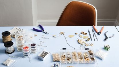 jewelry making supplies on table for hobby income