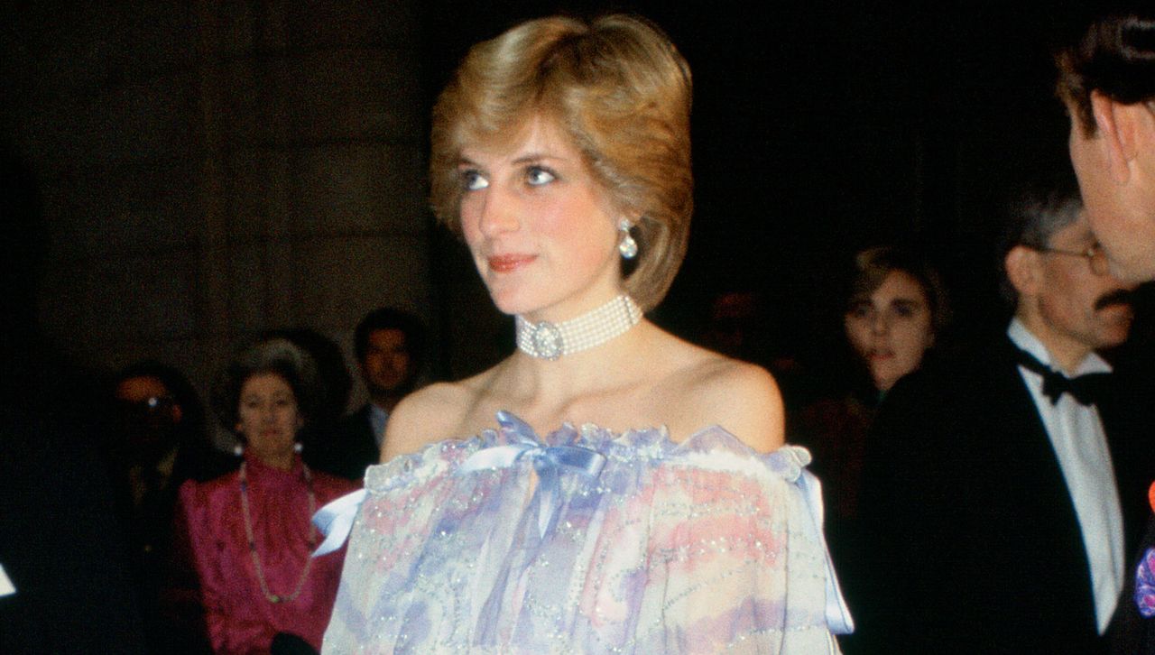 Princess Diana attends an event wearing a blue dress similar to the gown used on Bridgerton