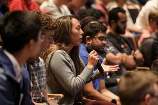 A student asks a question at the end of the panel, "An Evening with Trailblazers — Are We Going To Mars?" at Rensselaer Polytechnic Institute on Sept. 26, 2018.