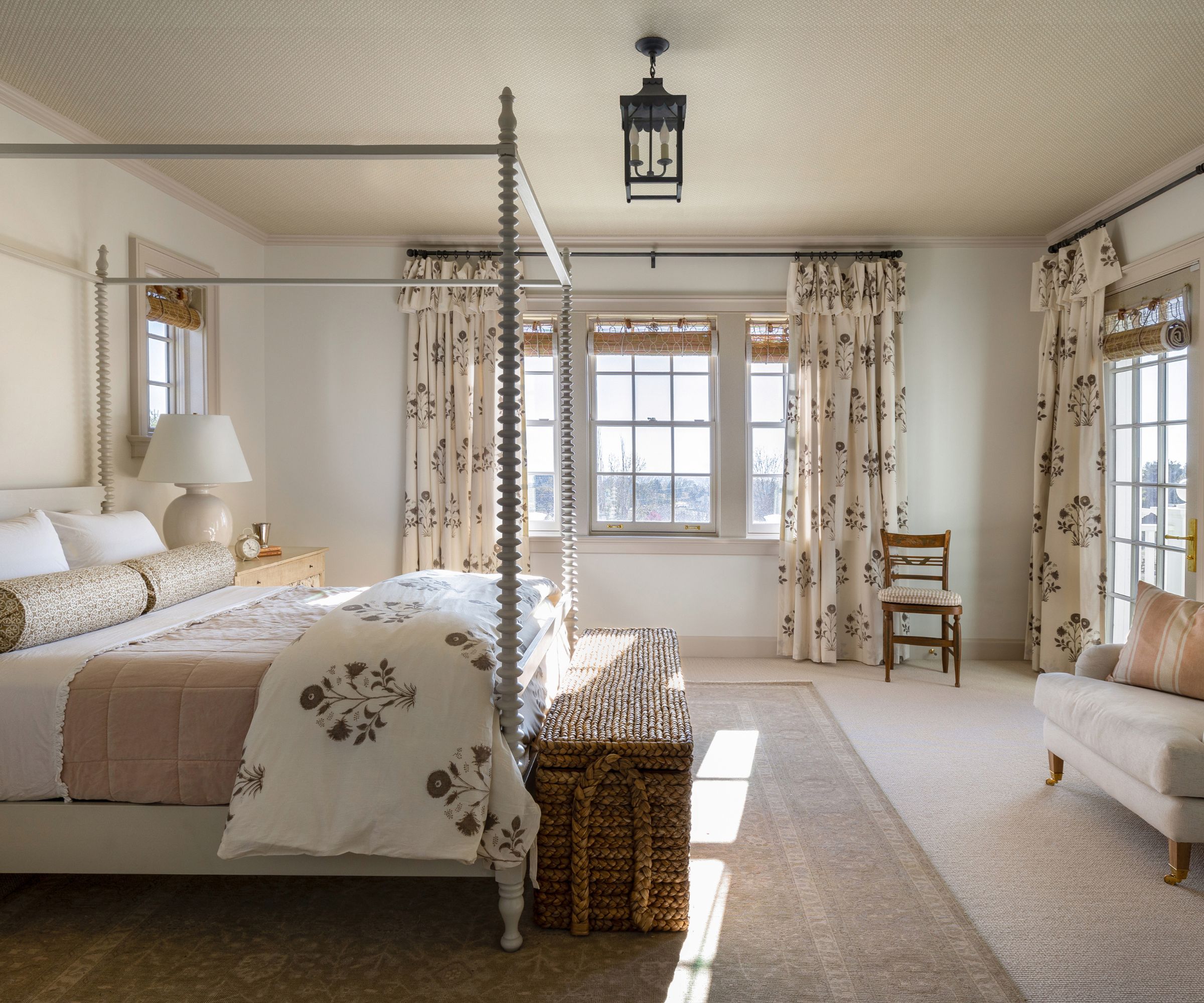 bedroom with four poster and cream walls